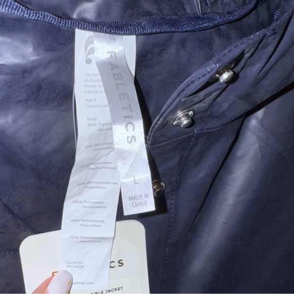 New! Fabletics Kenna Convertible Rain Jacket
Color: Deep Navy Travel Long/Short - Picture 12 of 16